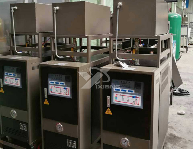 碳纖維使用導(dǎo)熱油加熱器控溫——模溫機(jī)